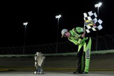 Rowdy gives his signature bow to the Sprint Cup trophy. Photo: Jared C. Tilton/NASCAR via Getty Images
