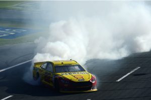 Joey Logano burns down the house in Charlotte. Photo: Robert Laberge/NASCAR via Getty Images)