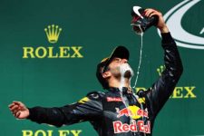Daniel Ricciardo celebrates his podium finish by chugging champagne from his shoe. Photo: Mark Thompson/Getty Images