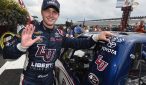 William Byron poses next to his truck after scoring his fifth win of the season at Pocono Raceway. Photo: Rainier Ehrhardt/NASCAR via Getty Images