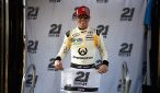 Erik Jones poses for pictures after winning the pole for the VisitMyrtleBeach.com 300 at Kentucky Speedway. Photo: Jonathan Moore/NASCAR via Getty Images