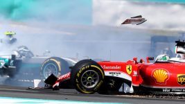 Sebastian Vettel suffered race-ending damage after contact with Nico Rosberg in turn 1 on the first lap of the Malaysian Grand Prix. Photo: Clive Rose/Getty Images