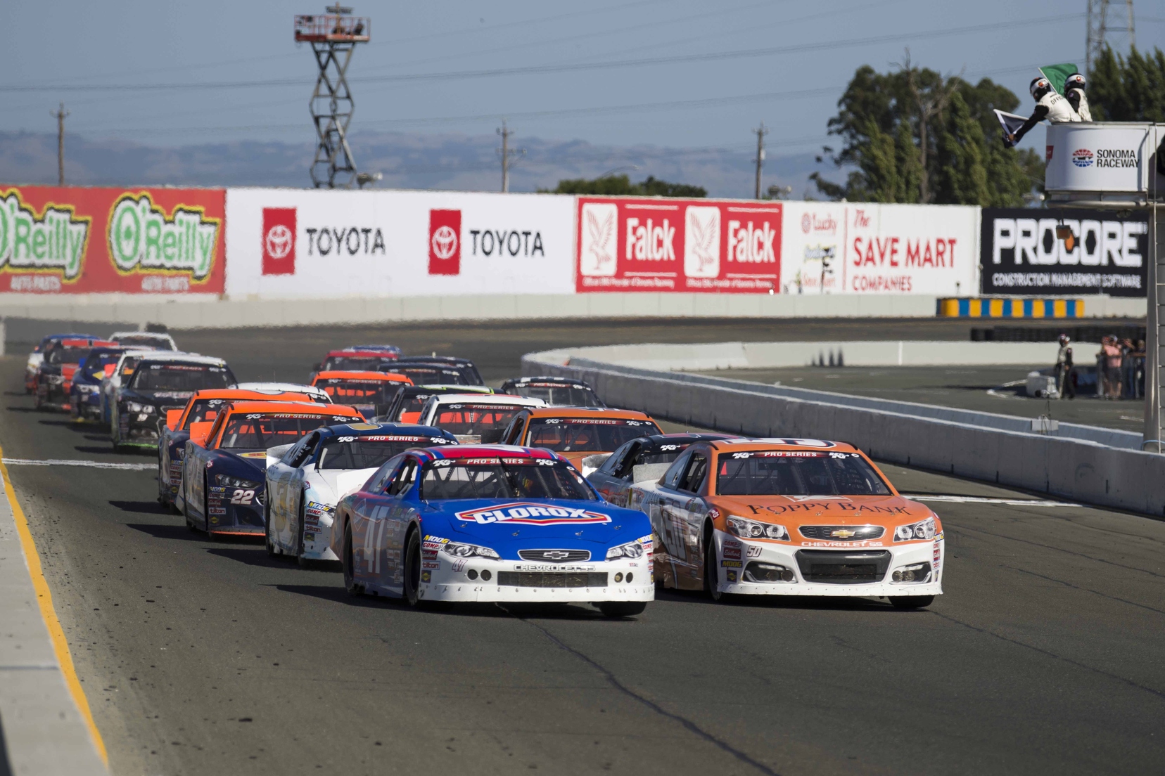 Ryan Preece (left) and Daniel Hemric (right) lead the field during one of the three overtime restarts. Photo courtesy of Patrick Sue-Chan for Speedway Media.